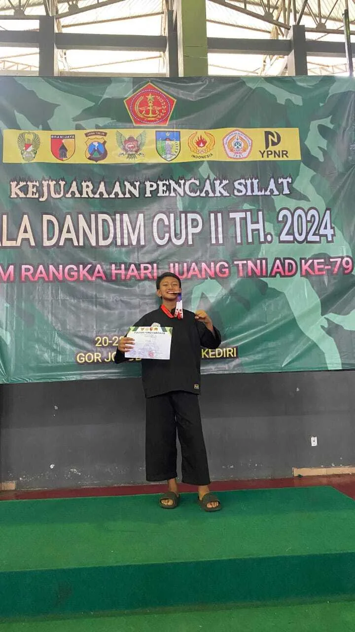 Juara III Kejuaraan Pencak Silat Dandim Cup II HUT TNI ke-79 (Abraham Adi Surya Gloria - 7D)